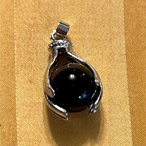 Sterling silver and Onyx double hand pendant